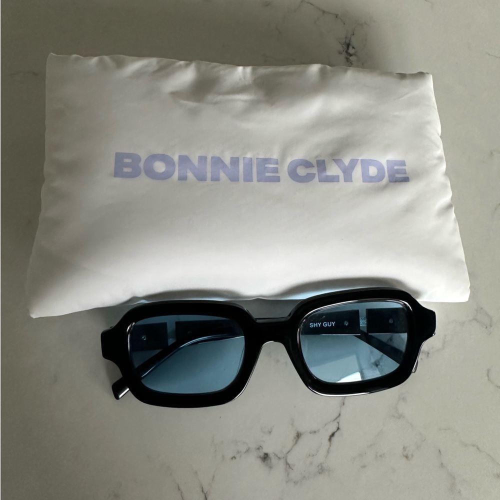 Bonnie Clyde Shy Guy Glasses. Black with blue lenses.